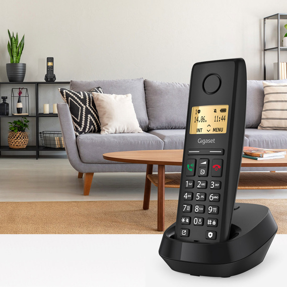 Gigaset PURE 200 on table in modern living room